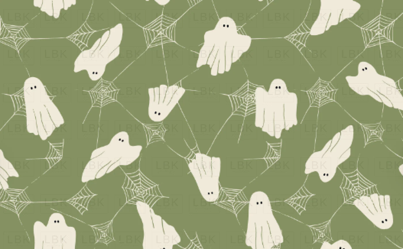 spooky Halloween ghosts and webs on green